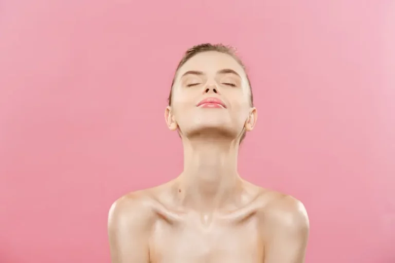 a woman showing her surgery results of neck lift in turkey